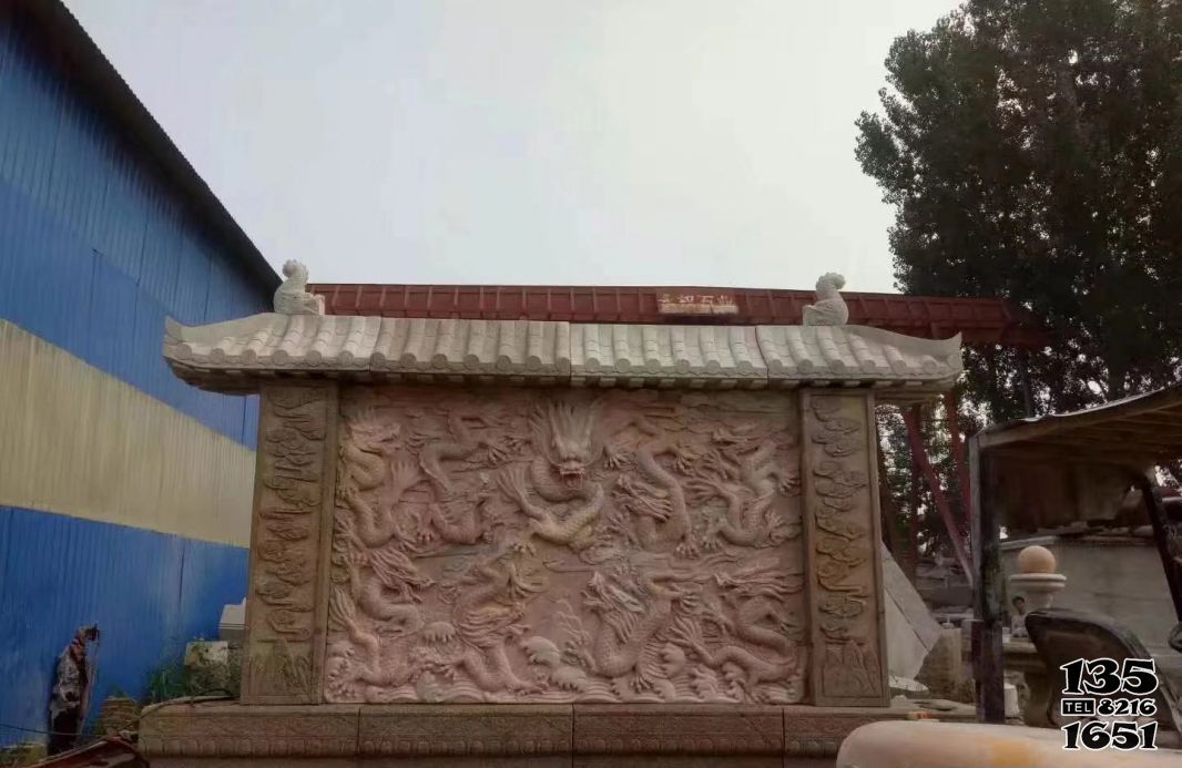 九龍壁雕塑-晚霞紅公園別墅龍浮雕影壁 九龍壁雕塑-晚霞紅公園別墅龍浮雕影壁高清圖片