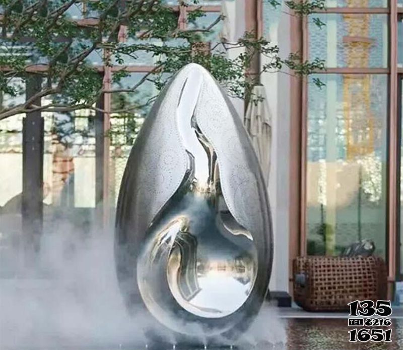 水滴雕塑-庭院池塘創意不銹鋼抽象鏤空水滴雕塑 水滴雕塑-庭院池塘創意不銹鋼抽象鏤空水滴雕塑高清圖片