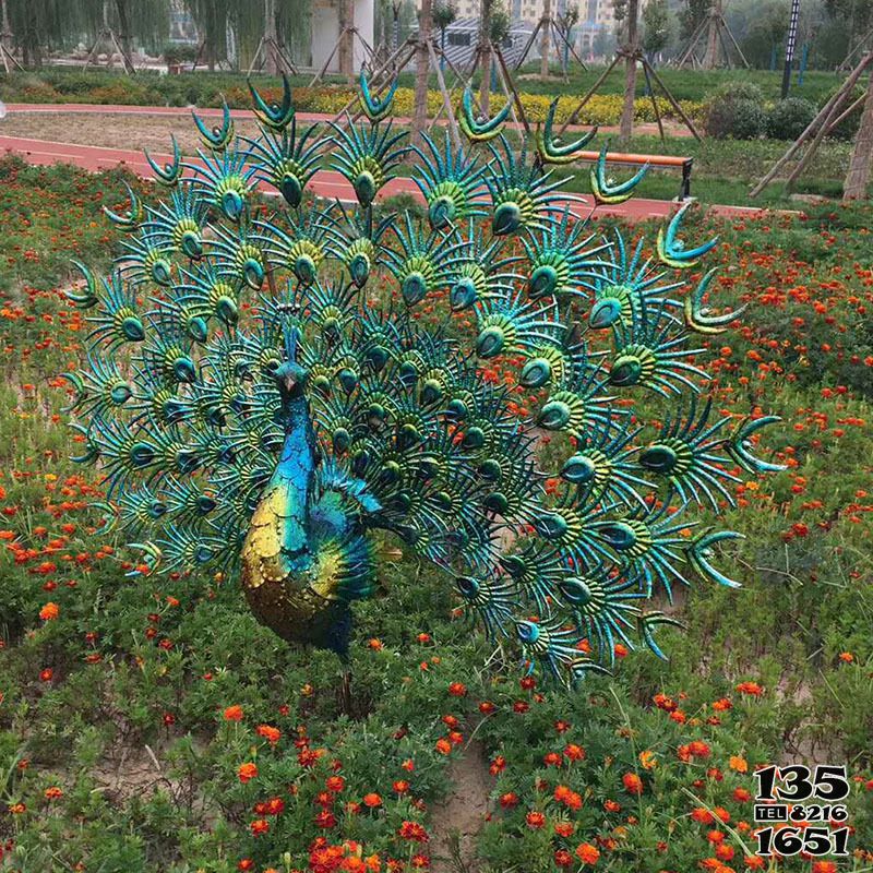 孔雀雕塑-花園里一只跳舞的不銹鋼鏤空孔雀雕塑 孔雀雕塑-花園里一只跳舞的不銹鋼鏤空孔雀雕塑