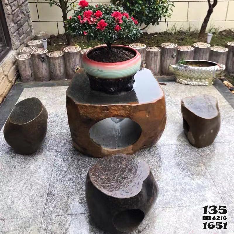 桌椅雕塑-小區(qū)庭院擺放異形切面鏤空石桌凳 桌椅雕塑-小區(qū)庭院擺放異形切面鏤空石桌凳高清圖片