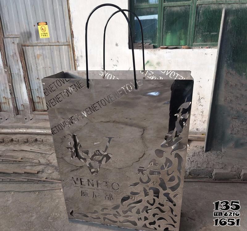 購物袋雕塑-商場不銹鋼鏤空創意購物袋雕塑 購物袋雕塑-商場不銹鋼鏤空創意購物袋雕塑高清圖片