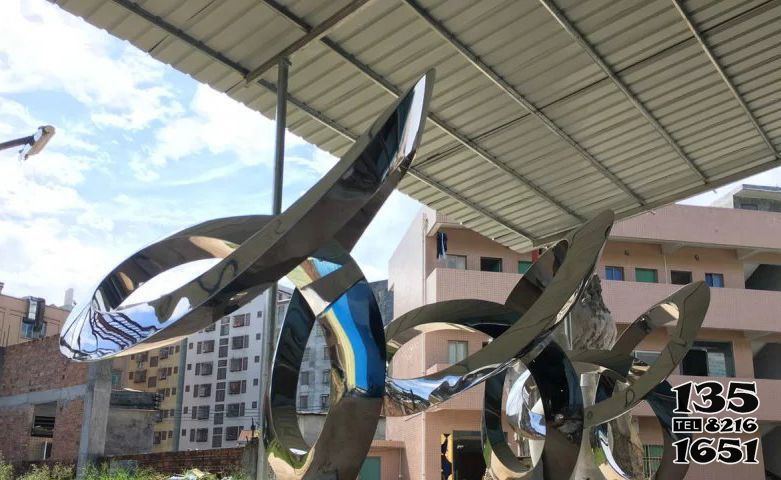 飄帶雕塑-商廈小區(qū)不銹鋼鏡面飄帶雕塑 飄帶雕塑-商廈小區(qū)不銹鋼鏡面飄帶雕塑高清圖片