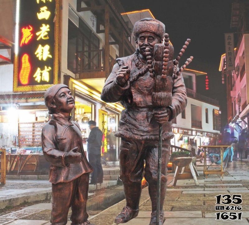 糖葫蘆雕塑-民宿文化街邊擺放賣糖葫蘆的人物銅雕 糖葫蘆雕塑-民宿文化街邊擺放賣糖葫蘆的人物銅雕高清圖片