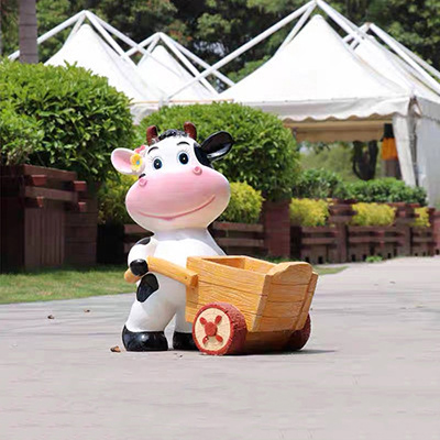 牛雕塑-動物園一只推車的玻璃鋼牛雕塑 牛雕塑-動物園一只推車的玻璃鋼牛雕塑高清圖片