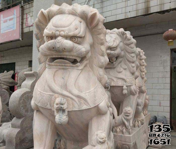 獅子雕塑-晚霞紅創意浮雕石雕鎮宅的獅子雕塑 獅子雕塑-晚霞紅創意浮雕石雕鎮宅的獅子雕塑高清圖片