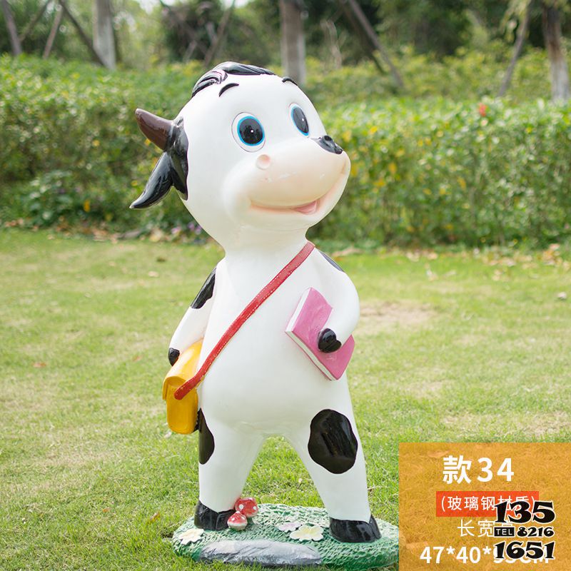 牛雕塑-幼兒園一只背書包拿書的玻璃鋼牛雕塑 牛雕塑-幼兒園一只背書包拿書的玻璃鋼牛雕塑高清圖片