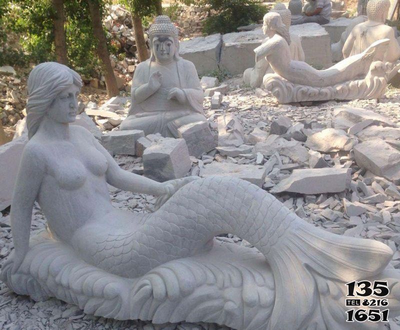 美人魚雕塑-街道上擺放的漢白玉石雕創(chuàng)意美人魚雕塑 美人魚雕塑-街道上擺放的漢白玉石雕創(chuàng)意美人魚雕塑高清圖片