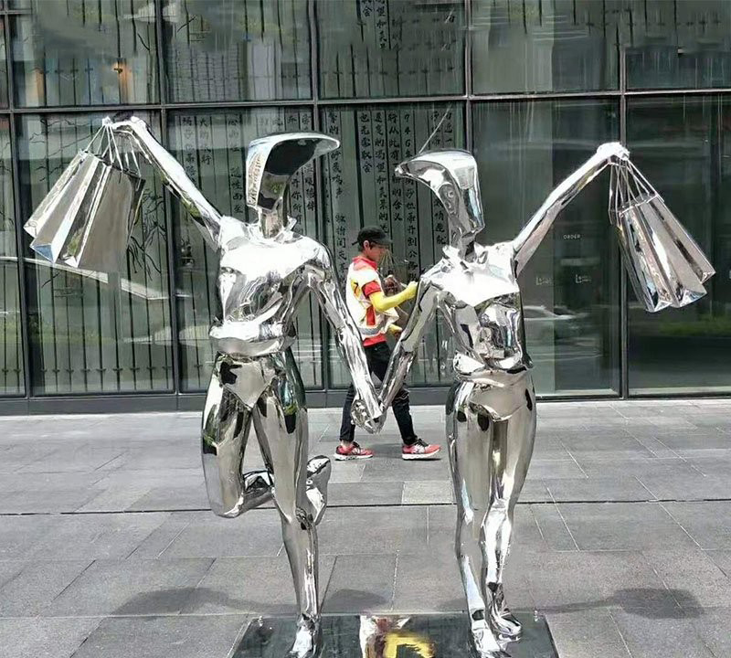 鏡面不銹鋼抽象購物人物-不銹鋼鏡面抽象購物人物雕塑 鏡面不銹鋼抽象購物人物-不銹鋼鏡面抽象購物人物雕塑高清圖片